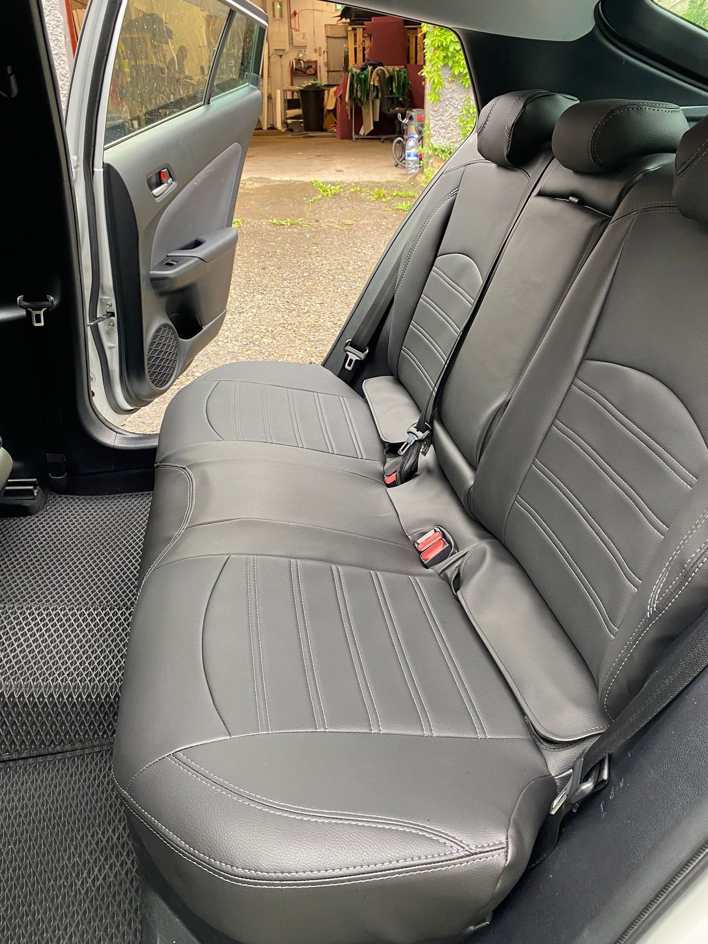 White hatchback rear — grey ECO leather